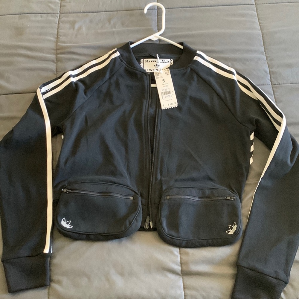 Adidas women’s size small jacket. New with tags.